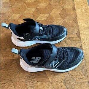 New Balance Black and White Sneakers with Mesh Upper